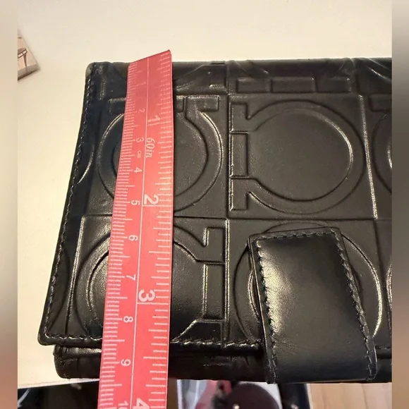 Salvatore Ferragamo Gancini Black Embossed Bifold Leather Wallet